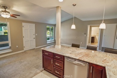 Absolutely gorgeous open floor plan.  Beautiful kitchen granite on Friendly Valley Golf Course in California - for sale on GolfHomes.com, golf home, golf lot