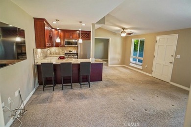 Absolutely gorgeous open floor plan.  Beautiful kitchen granite on Friendly Valley Golf Course in California - for sale on GolfHomes.com, golf home, golf lot