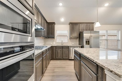 Beautifully maintained single-story home offering 3 bedrooms, 2 on The Golf Club At Champions Circle in Texas - for sale on GolfHomes.com, golf home, golf lot