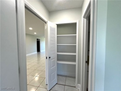 CLEAN, CRISP and FRESHLY PAINTED CORNER UNIT! This condo is on Myerlee Country Club in Florida - for sale on GolfHomes.com, golf home, golf lot