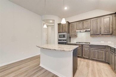 Beautifully maintained single-story home offering 3 bedrooms, 2 on The Golf Club At Champions Circle in Texas - for sale on GolfHomes.com, golf home, golf lot