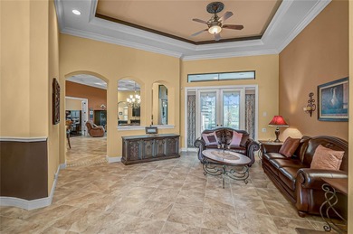 BACK ON MARKET! Discover refined Florida living in this on Plantation Golf and Country Club in Florida - for sale on GolfHomes.com, golf home, golf lot