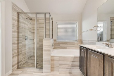 Beautifully maintained single-story home offering 3 bedrooms, 2 on The Golf Club At Champions Circle in Texas - for sale on GolfHomes.com, golf home, golf lot