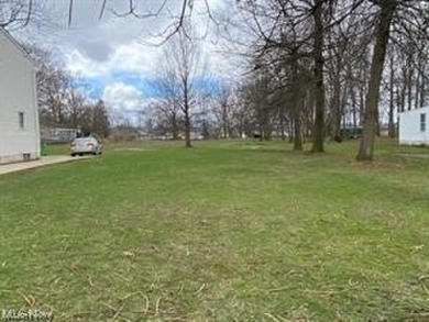 Here's a unique, buildable parcel of land in Wickliffe.  The on Green Ridge Golf Course in Ohio - for sale on GolfHomes.com, golf home, golf lot