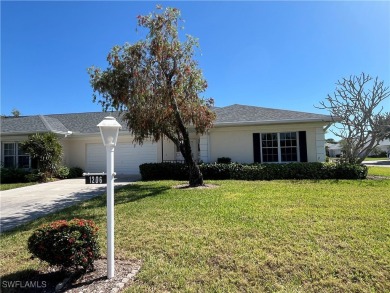CLEAN, CRISP and FRESHLY PAINTED CORNER UNIT! This condo is on Myerlee Country Club in Florida - for sale on GolfHomes.com, golf home, golf lot