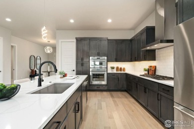 Experience the best of Water Valley living in this rare, premium on Pelican Lakes Golf and Country Club in Colorado - for sale on GolfHomes.com, golf home, golf lot