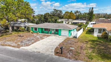 Welcome to this delightful 2-bedroom, 2-bathroom home in the on Pinecrest Golf Club in Florida - for sale on GolfHomes.com, golf home, golf lot