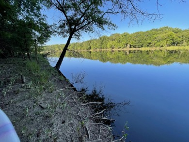 LOVELY SLICE OF ARKANSAS PARADISE IN CITY LIMITS!  Gorgeous on Clarksville Country Club in Arkansas - for sale on GolfHomes.com, golf home, golf lot