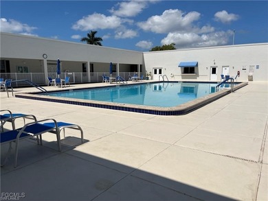 CLEAN, CRISP and FRESHLY PAINTED CORNER UNIT! This condo is on Myerlee Country Club in Florida - for sale on GolfHomes.com, golf home, golf lot