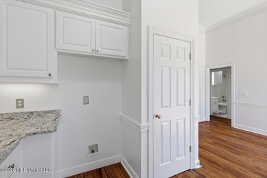 This thoughtfully designed home offers quality construction on Patrick Farms Golf Club in Mississippi - for sale on GolfHomes.com, golf home, golf lot