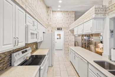 BEAUTIFULLY MAINTAINED, FULLY FURNISHED TURNKEY VILLA IN on Timber Pines Golf Course in Florida - for sale on GolfHomes.com, golf home, golf lot