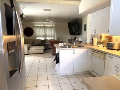 This is a rare opportunity to buy a turnkey (yes- everything is on Pinemoor West Golf Club in Florida - for sale on GolfHomes.com, golf home, golf lot