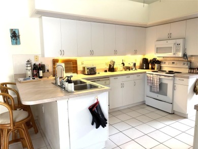 This is a rare opportunity to buy a turnkey (yes- everything is on Pinemoor West Golf Club in Florida - for sale on GolfHomes.com, golf home, golf lot