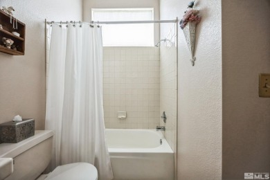NEW HEFTY PRICE IMPROVEMENT! Charming 2-bedroom, 2.5-bath home on LakeRidge Golf Course in Nevada - for sale on GolfHomes.com, golf home, golf lot