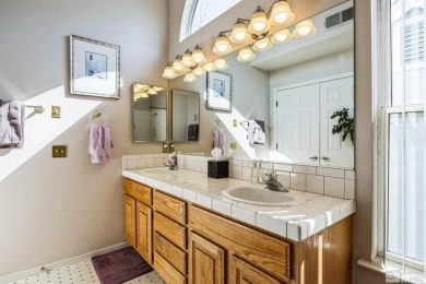 NEW HEFTY PRICE IMPROVEMENT! Charming 2-bedroom, 2.5-bath home on LakeRidge Golf Course in Nevada - for sale on GolfHomes.com, golf home, golf lot