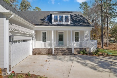 Welcome to this stunning new construction home situated on the on Sound Golf Links at Albemarle Plantation in North Carolina - for sale on GolfHomes.com, golf home, golf lot