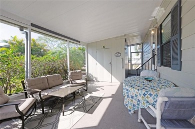 This stylish 2BR/2BA home features a spacious 240 s/f glass on Riviera Golf Club in Florida - for sale on GolfHomes.com, golf home, golf lot