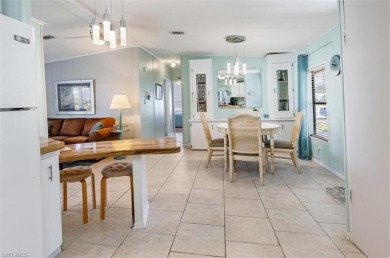 This stylish 2BR/2BA home features a spacious 240 s/f glass on Riviera Golf Club in Florida - for sale on GolfHomes.com, golf home, golf lot
