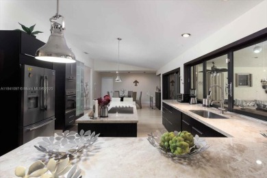 UNIQUE SINGLE FAMILY HOME 4 BEDROOMS/3.5 BATHROOMS IN PALM AIRE on Oaks Country Club in Florida - for sale on GolfHomes.com, golf home, golf lot