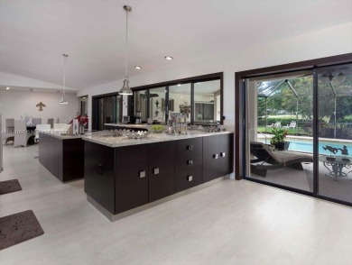 UNIQUE SINGLE FAMILY HOME 4 BEDROOMS/3.5 BATHROOMS IN PALM AIRE on Oaks Country Club in Florida - for sale on GolfHomes.com, golf home, golf lot