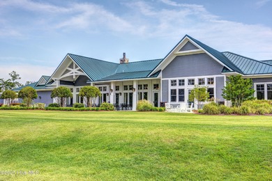 Exquisite home with a view of the pond located in the on Cape Fear National At Brunswick Forest in North Carolina - for sale on GolfHomes.com, golf home, golf lot