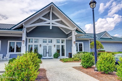 Exquisite home with a view of the pond located in the on Cape Fear National At Brunswick Forest in North Carolina - for sale on GolfHomes.com, golf home, golf lot