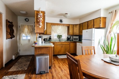 Enjoy 2 living spaces at 1 great price! Enjoy multi-generational on Bill Roberts Municipal Golf Course in Montana - for sale on GolfHomes.com, golf home, golf lot