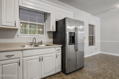 Looking for a home in a great neighborhood and a quiet setting? on Mississippi National Golf Course in Mississippi - for sale on GolfHomes.com, golf home, golf lot