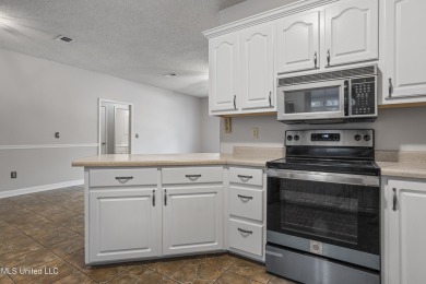 Looking for a home in a great neighborhood and a quiet setting? on Mississippi National Golf Course in Mississippi - for sale on GolfHomes.com, golf home, golf lot