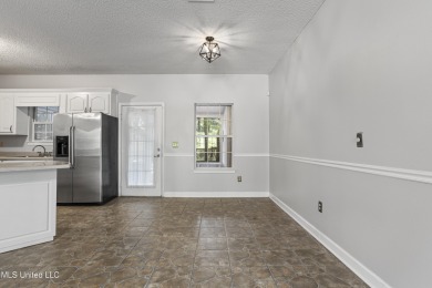 Looking for a home in a great neighborhood and a quiet setting? on Mississippi National Golf Course in Mississippi - for sale on GolfHomes.com, golf home, golf lot