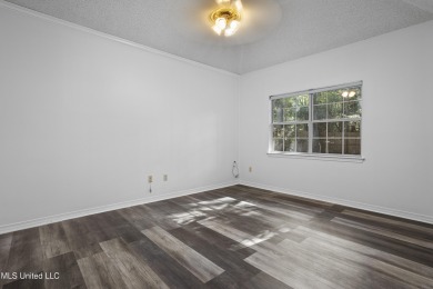 Looking for a home in a great neighborhood and a quiet setting? on Mississippi National Golf Course in Mississippi - for sale on GolfHomes.com, golf home, golf lot