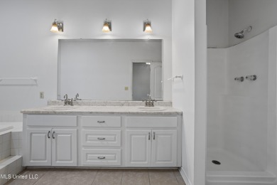 Looking for a home in a great neighborhood and a quiet setting? on Mississippi National Golf Course in Mississippi - for sale on GolfHomes.com, golf home, golf lot