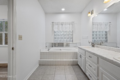 Looking for a home in a great neighborhood and a quiet setting? on Mississippi National Golf Course in Mississippi - for sale on GolfHomes.com, golf home, golf lot