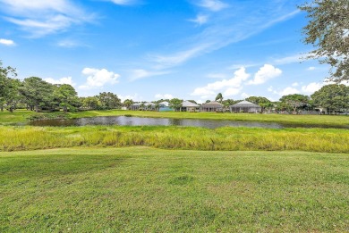 BEAUTIFUL LAKEFRONT 3BR, 2BA, 2CG Open Concept Hampton model on Monarch Country Club in Florida - for sale on GolfHomes.com, golf home, golf lot