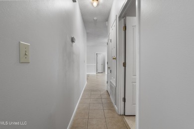 Looking for a home in a great neighborhood and a quiet setting? on Mississippi National Golf Course in Mississippi - for sale on GolfHomes.com, golf home, golf lot