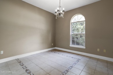 Looking for a home in a great neighborhood and a quiet setting? on Mississippi National Golf Course in Mississippi - for sale on GolfHomes.com, golf home, golf lot