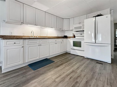 One or more photo(s) has been virtually staged. Discover your on Sabal Trace Golf and Country Club in Florida - for sale on GolfHomes.com, golf home, golf lot