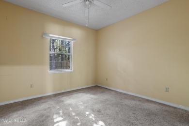 Looking for a home in a great neighborhood and a quiet setting? on Mississippi National Golf Course in Mississippi - for sale on GolfHomes.com, golf home, golf lot