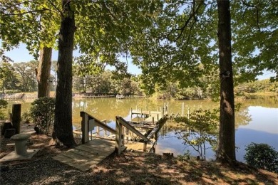 Welcome to 99 Mariners Watch Lane! This residence spans 5.21 AC on Indian Creek Yacht and Country Club in Virginia - for sale on GolfHomes.com, golf home, golf lot