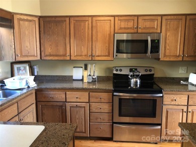 The perfect blend of comfort and investment awaits you in on Kenmure Country Club in North Carolina - for sale on GolfHomes.com, golf home, golf lot