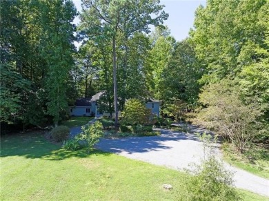 Welcome to 99 Mariners Watch Lane! This residence spans 5.21 AC on Indian Creek Yacht and Country Club in Virginia - for sale on GolfHomes.com, golf home, golf lot