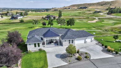 Experience luxury living at its finest with this stunning home on The Powder Horn Golf Club - Mountain in Wyoming - for sale on GolfHomes.com, golf home, golf lot