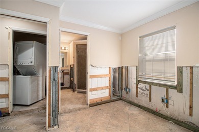 This investor special offers a unique opportunity for those on Twin Isles Country Club in Florida - for sale on GolfHomes.com, golf home, golf lot