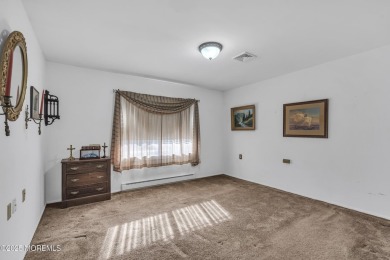 This popular Baronet is in move in condition. Situated one block on Greenbriar Woodlands in New Jersey - for sale on GolfHomes.com, golf home, golf lot