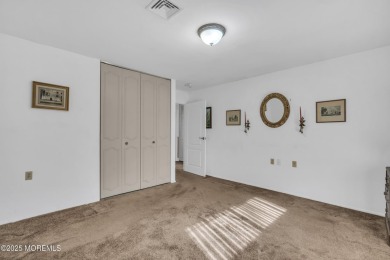 This popular Baronet is in move in condition. Situated one block on Greenbriar Woodlands in New Jersey - for sale on GolfHomes.com, golf home, golf lot