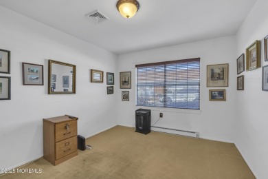 This popular Baronet is in move in condition. Situated one block on Greenbriar Woodlands in New Jersey - for sale on GolfHomes.com, golf home, golf lot
