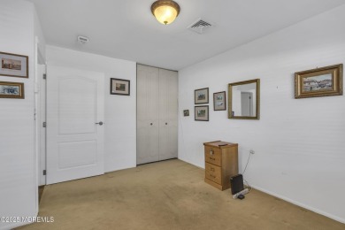 This popular Baronet is in move in condition. Situated one block on Greenbriar Woodlands in New Jersey - for sale on GolfHomes.com, golf home, golf lot