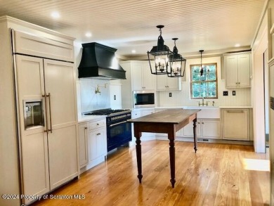 A restoration beyond compare!  This 1850's center hall colonial on Lakeland Golf Course in Pennsylvania - for sale on GolfHomes.com, golf home, golf lot