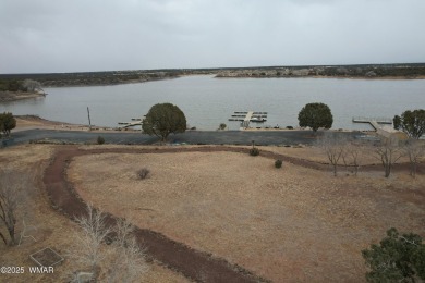 Private Lake Living! This stunning 3 bed, 2 bath home w/granite on Silver Creek Golf Club in Arizona - for sale on GolfHomes.com, golf home, golf lot