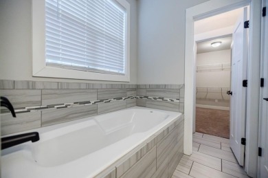 Located on one of the best streets in East Lake, this like-new on East Lake Golf Club in Georgia - for sale on GolfHomes.com, golf home, golf lot